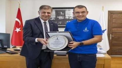 Tarihi başarılara imza atan Tuna, Başkan Tugay’la buluştu